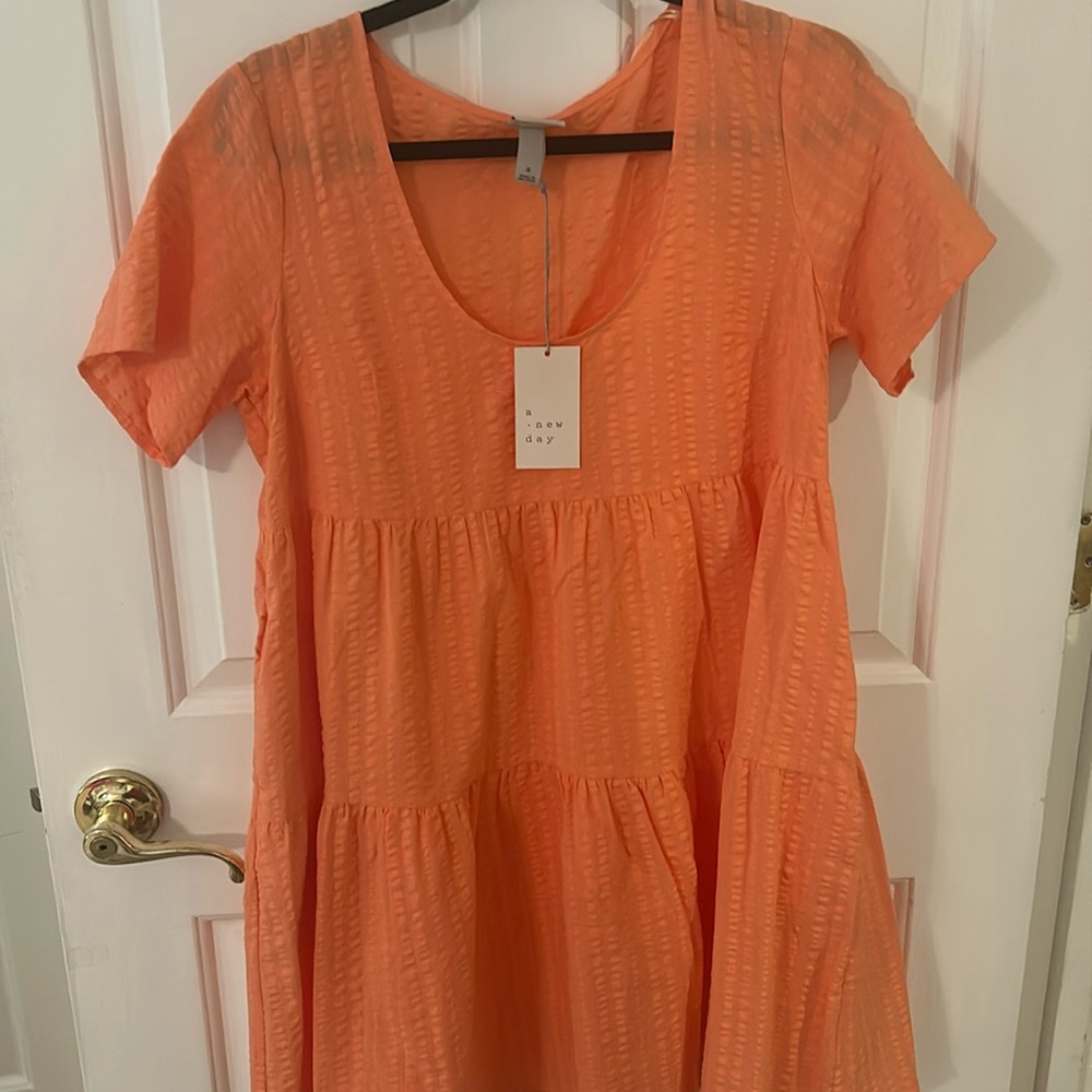 Brand new orange short sleeve dress size small